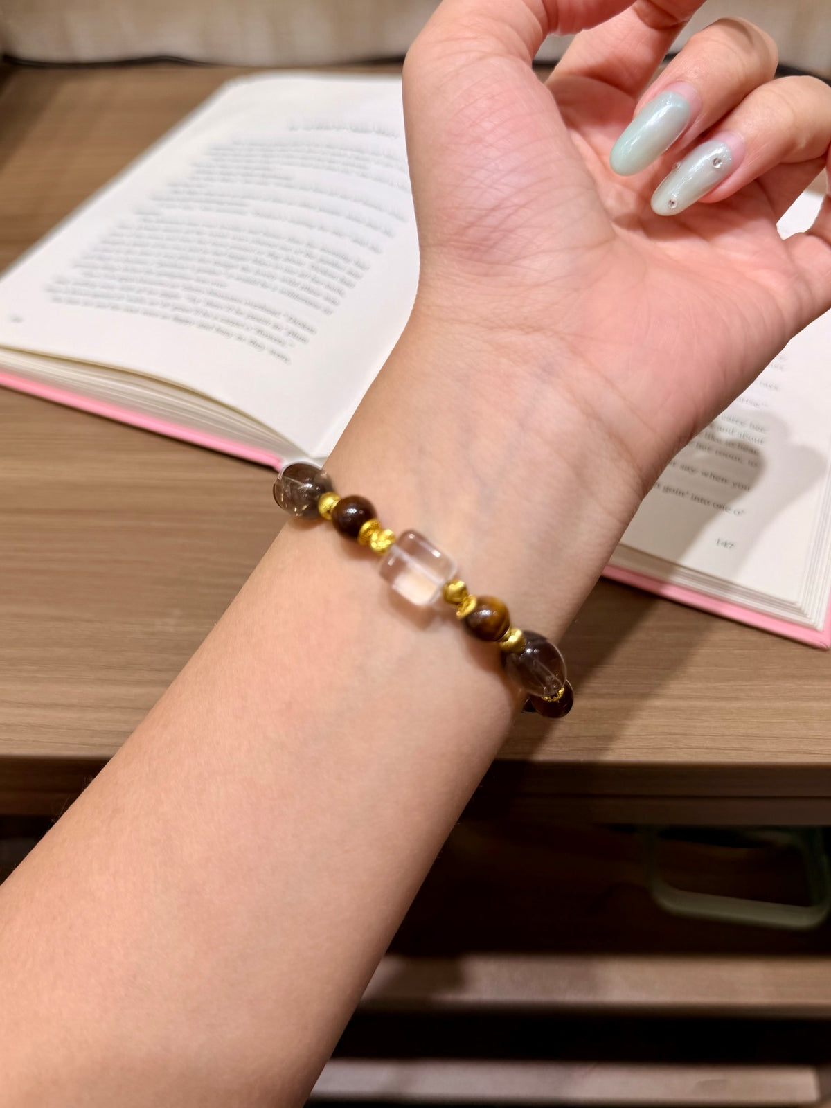 Retro brown-gold bracelet worn on a wrist