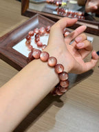 Pink Lepidolite Bracelet worn on wrist, shimmering pink lepidolite beads