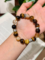 Golden Tiger Fortune Bracelet worn on wrist, golden tiger's eye and hematoid quartz beads