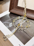 Clear quartz lotus car charm with citrine peace buckle