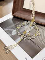 Clear quartz lotus car charm with citrine peace buckle